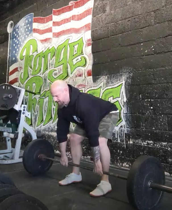 Rob at Sabertooth Fitness Company deadlifting at gym